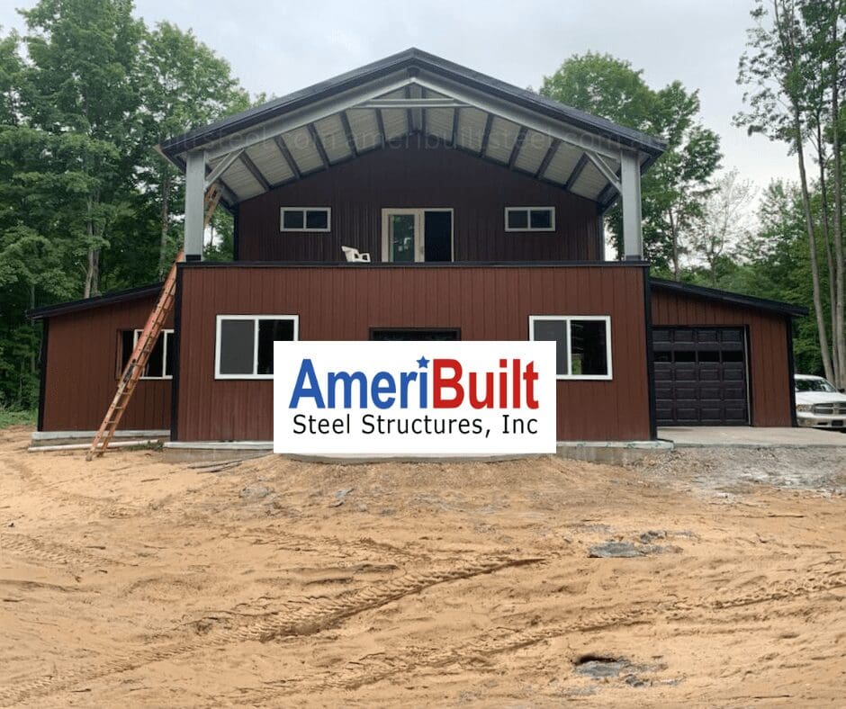 modern barndominium home with brown color and black garage door